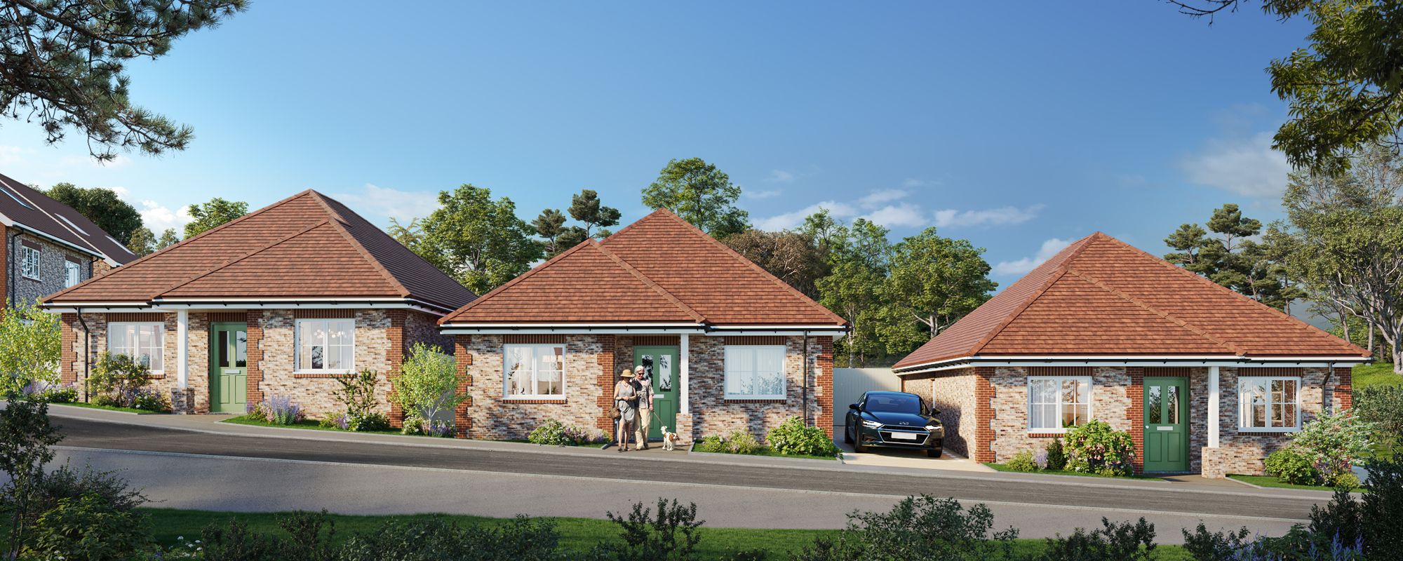 The three detached bungalows with hipped clay tile roofs